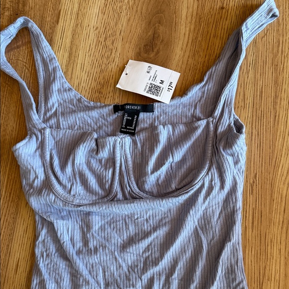 Baby blue body suit from Forever 21. Never worn. Size M - Picture 3 of 4